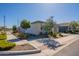 Street view of the house shows a well-landscaped yard and a quiet neighborhood at 4925 S Turbine --, Mesa, AZ 85212