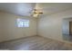Bedroom with beautiful flooring and natural light coming through the window at 5657 E Dallas St, Mesa, AZ 85205