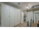 This is a garage with built in storage cabinets and a water heater at 5657 E Dallas St, Mesa, AZ 85205
