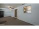 Finished basement living room with window, bar, and recessed lighting at 5657 E Dallas St, Mesa, AZ 85205