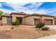 Single-story home with desert landscaping, gravel yard, and a covered front porch at 5749 S Dragoon Dr, Chandler, AZ 85249