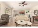 Inviting living room with hardwood floors, neutral walls, and a comfortable seating arrangement at 5749 S Dragoon Dr, Chandler, AZ 85249