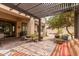Covered outdoor patio with brick pavers and comfortable seating at 5749 S Dragoon Dr, Chandler, AZ 85249