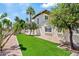 Lush backyard featuring green grass and mature trees at 6001 N 10Th Way, Phoenix, AZ 85014