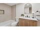 Bathroom with modern vanity, bathtub, and decorative mirror at 6001 N 10Th Way, Phoenix, AZ 85014