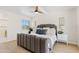 Tranquil bedroom boasts a luxurious bed, elegant nightstands, and a bright window view at 6001 N 10Th Way, Phoenix, AZ 85014