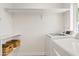 Bright laundry room with modern washer and dryer at 6001 N 10Th Way, Phoenix, AZ 85014