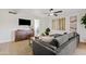 Bright living room showcases a comfortable sectional sofa, mounted TV, and contemporary decor at 6001 N 10Th Way, Phoenix, AZ 85014