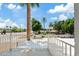 Balcony view overlooking palm trees, street, and pool at 6001 N 10Th Way, Phoenix, AZ 85014