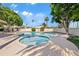 Community pool featuring ample seating and well-manicured landscaping at 6001 N 10Th Way, Phoenix, AZ 85014
