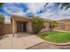 Backyard features a patio and landscaped yard with green grass at 6085 S Wilson Dr, Chandler, AZ 85249