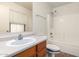 Clean bathroom with single vanity, vinyl countertop and tiled shower and tub at 6085 S Wilson Dr, Chandler, AZ 85249
