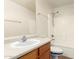 Bathroom featuring a single sink vanity, toilet, and shower over tub at 6085 S Wilson Dr, Chandler, AZ 85249