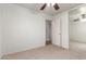 Bright bedroom featuring a ceiling fan and closet with mirrored doors at 6085 S Wilson Dr, Chandler, AZ 85249
