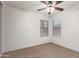 Neutral bedroom with carpet, ceiling fan, and bright windows at 6085 S Wilson Dr, Chandler, AZ 85249