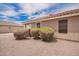 This house has desert landscaping with pebble ground cover and bushes at 6085 S Wilson Dr, Chandler, AZ 85249