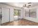 Bright eat-in kitchen with sliding glass door, tile floors and ceiling fan at 6085 S Wilson Dr, Chandler, AZ 85249