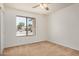 Bright bedroom with carpet, a window, and a ceiling fan at 6602 W Ironwood Dr, Glendale, AZ 85302