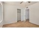 Bedroom features neutral carpet, and a spacious closet at 6602 W Ironwood Dr, Glendale, AZ 85302