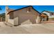 Spacious garage with ample driveway space, perfect for multiple vehicles and easy access at 6602 W Ironwood Dr, Glendale, AZ 85302
