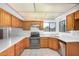Updated kitchen with quartz countertops, stainless steel appliances, and tile flooring at 6602 W Ironwood Dr, Glendale, AZ 85302