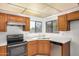 Bright kitchen with quartz countertops, stainless steel appliances, and natural light at 6602 W Ironwood Dr, Glendale, AZ 85302