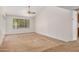 Bright, carpeted living room featuring high ceilings and a large window at 6602 W Ironwood Dr, Glendale, AZ 85302