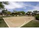Full sized basketball court in a green space featuring basketball hoops at 7214 E Rustling Pass, Scottsdale, AZ 85255