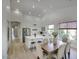 Bright kitchen with a center island, stainless steel appliances, and dining area, perfect for entertaining at 7214 E Rustling Pass, Scottsdale, AZ 85255