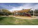 Community playground with shade sails, slides, and climbing structures at 7214 E Rustling Pass, Scottsdale, AZ 85255