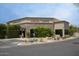Charming restaurant exterior with stone accents, lush landscaping, and inviting atmosphere for dining at 7214 E Rustling Pass, Scottsdale, AZ 85255