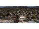 Scenic aerial view of a residential neighborhood nestled in the foothills of a mountain range, highlighting community charm at 8326 N 8Th St, Phoenix, AZ 85020