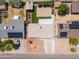 Aerial view featuring the home's roof, landscaping, and surrounding neighborhood at 8326 N 8Th St, Phoenix, AZ 85020