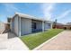 Backyard featuring a storage shed, low maintenance artifical turf, and covered patio at 8326 N 8Th St, Phoenix, AZ 85020
