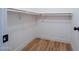 Walk-in closet features new flooring and built-in shelving, creating a functional space at 8326 N 8Th St, Phoenix, AZ 85020