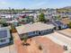 Aerial view showcasing the home's neutral exterior, shutters, landscaping, and long driveway at 8326 N 8Th St, Phoenix, AZ 85020
