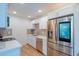 Modern kitchen with stainless steel appliances and white cabinets with hard surface countertops at 8326 N 8Th St, Phoenix, AZ 85020