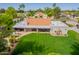 Spacious backyard with well-maintained lawn, covered patio, and lush landscaping providing an outdoor oasis at 8851 S Juniper St, Tempe, AZ 85284