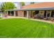Entertaining backyard patio with seating and outdoor grill for backyard relaxation and gatherings with friends and Gathering at 8851 S Juniper St, Tempe, AZ 85284