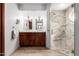 Elegant bathroom featuring dual vanities and walk-in marble shower at 8851 S Juniper St, Tempe, AZ 85284