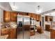 Modern kitchen with stainless steel refrigerator and oven at 8851 S Juniper St, Tempe, AZ 85284