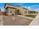 Stunning two-story home featuring desert landscaping, a tiled roof, and a charming front entrance at 9508 W Jj Ranch Rd, Peoria, AZ 85383