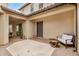 Covered patio featuring neutral color palette and plenty of seating, perfect for relaxing at 9508 W Jj Ranch Rd, Peoria, AZ 85383