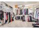 Large walk-in closet with ample shelving and hanging space for optimal organization at 9508 W Jj Ranch Rd, Peoria, AZ 85383