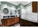 Bathroom with double vanity, granite countertops, and a shower/tub combination at 1147 N Marvin St, Gilbert, AZ 85233