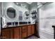 Bathroom with double vanity, granite countertops, and a shower/tub combination at 1147 N Marvin St, Gilbert, AZ 85233