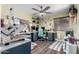Bedroom featuring hardwood floors, a work station, and neutral paint at 1147 N Marvin St, Gilbert, AZ 85233