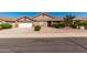 Charming single-story home featuring a well-manicured, low maintenance landscaped front yard and two-car garage at 1147 N Marvin St, Gilbert, AZ 85233