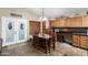 Cozy eat-in kitchen with ample cabinets and counter space, tiled flooring, and natural light at 1147 N Marvin St, Gilbert, AZ 85233