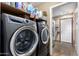 Laundry room with washer and dryer and utility storage, making laundry tasks a breeze at 1147 N Marvin St, Gilbert, AZ 85233